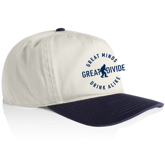 Beige and navy cap with 'Great Divide' logo on a white background